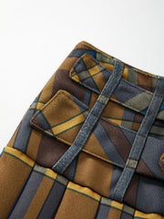 Mini-jupe en laine plissée à carreaux et à ceinture