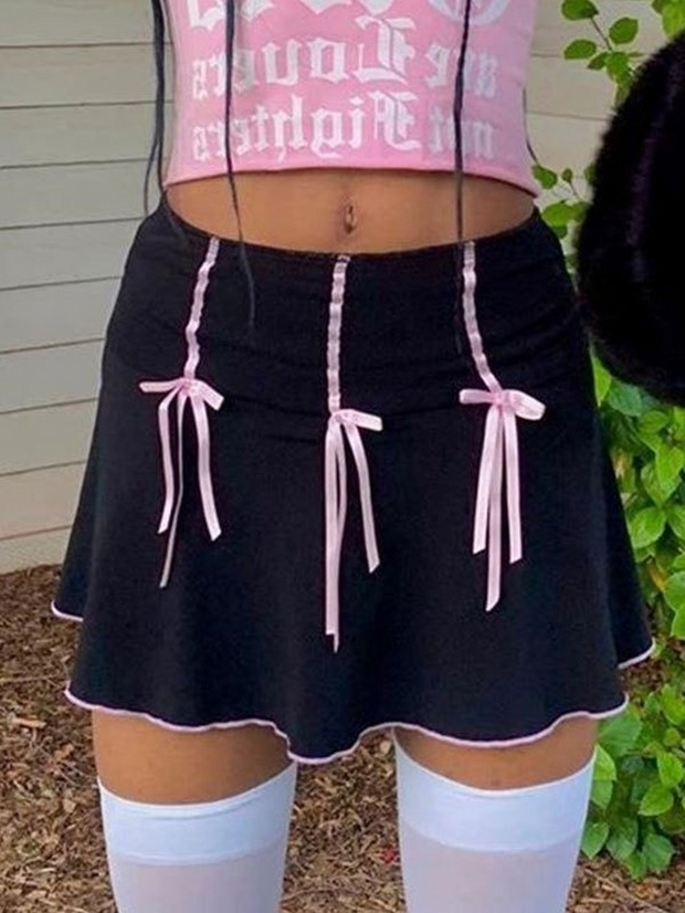 Mini-jupe taille haute à décor de nœud