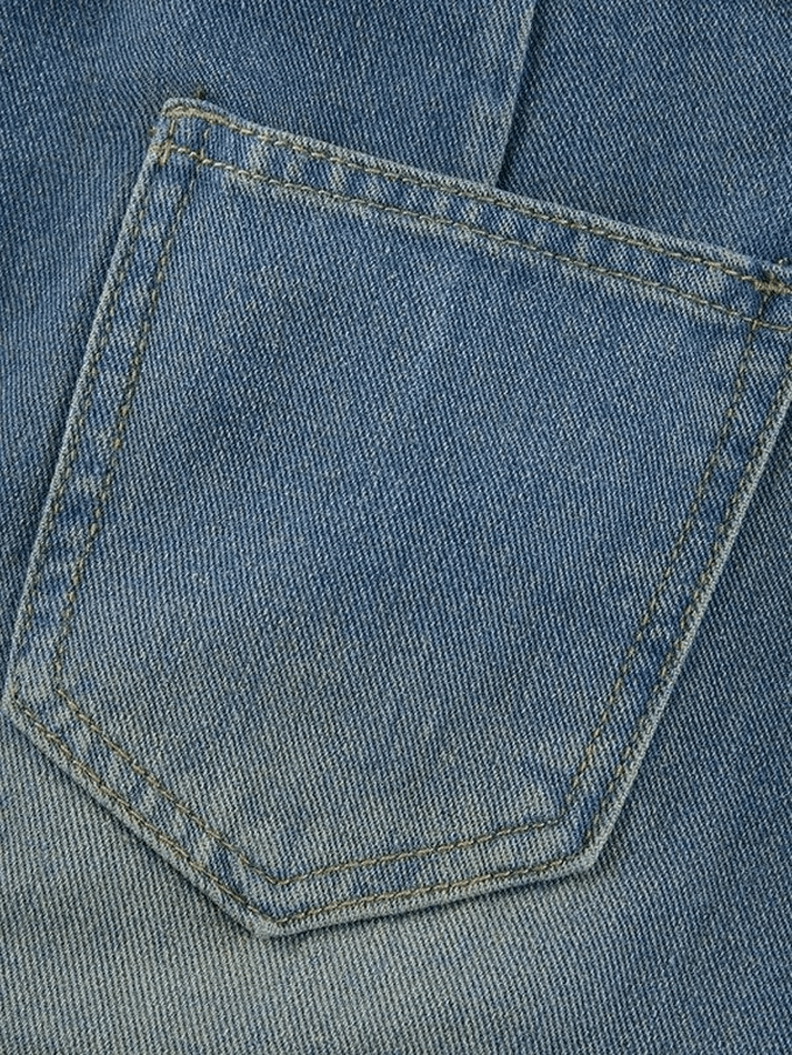 Mini-jupe en denim avec ceinture à boucle