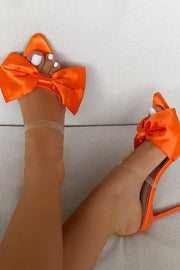 Mules à talons aiguilles en satin orange avec nœud