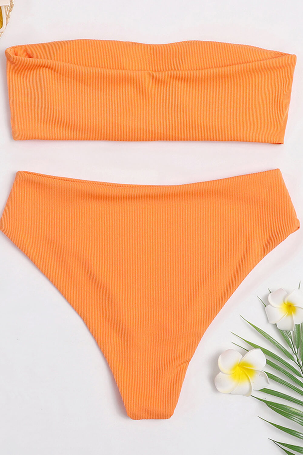 Orangefarbene, gerippte Bikinihose mit hohem Bund