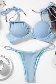 Himmelblaue, gerippte Bikinihose mit seitlichem String