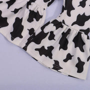 J'adore faire du shopping avec la tenue de vache Moo-lah de papa