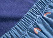 Regenbogenwolken-Jeanskleid mit Rüschen