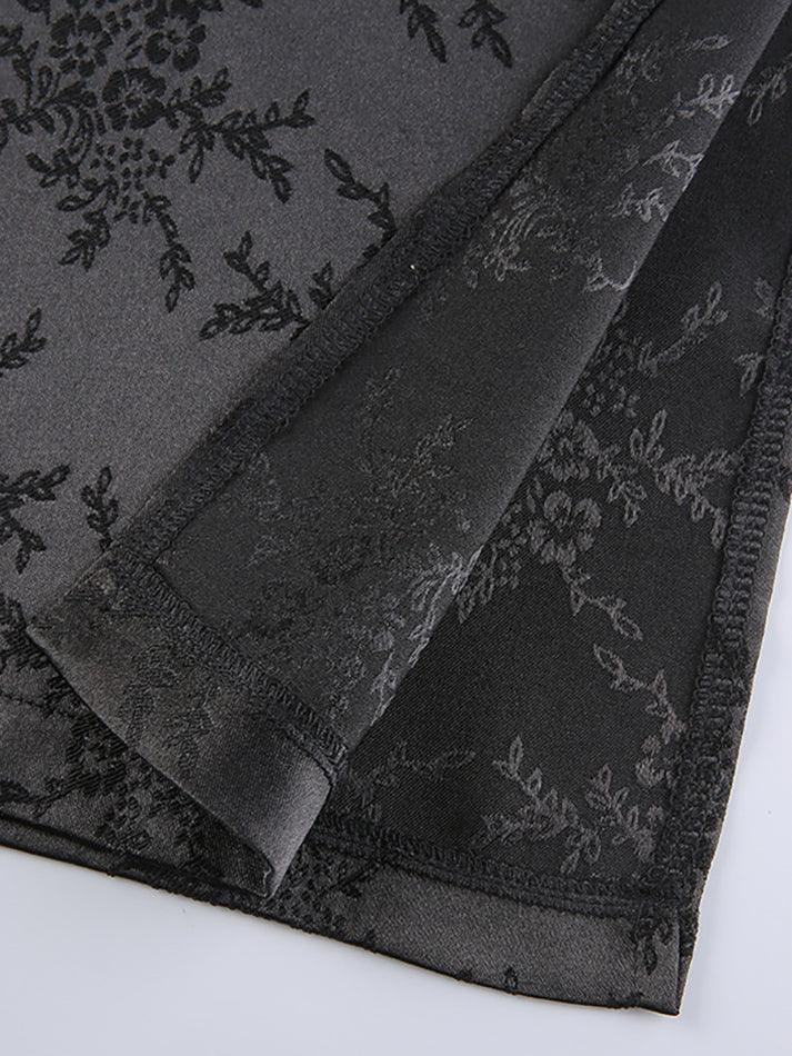 Jupe mi-longue fendue en jacquard satiné