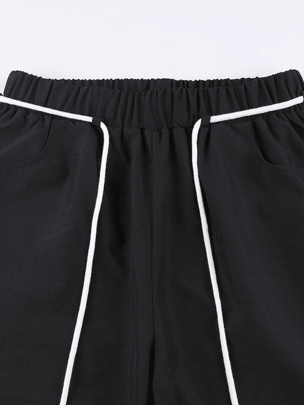 Pantalon baggy noir à rayures latérales